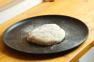 Preparation of classic home made margherita pizza