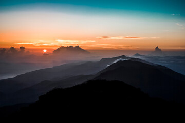View of a sunset from Naiguatá Peak, where you can also see the chain of peaks that make up the Avila National Park