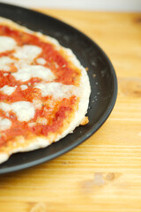 Preparation of classic home made margherita pizza