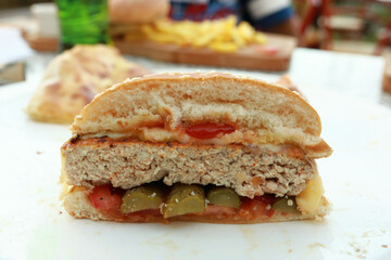 Half burger on plate