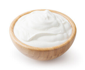 Sour cream in wooden bowl isolated on white background with clipping path