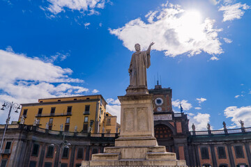 Fototapeta na wymiar Dante Aleghieri statue on Dante Square (Piazza Dante) in Napoli, Italy