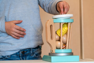 Child playing with kitchen toys