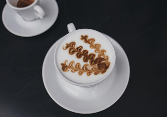 two mugs of coffee on the table