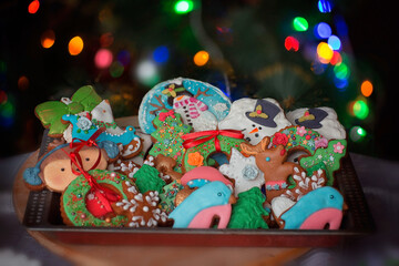 Home made Christmas cookies against the Christmas lights background.