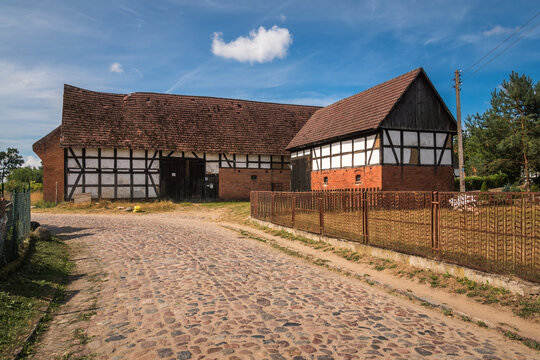 Historic buildings in the village known as the "checked land" in Swolowo, Pomorskie, Poland