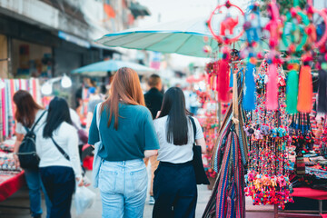 asian woman travel and shopping at thailand night market