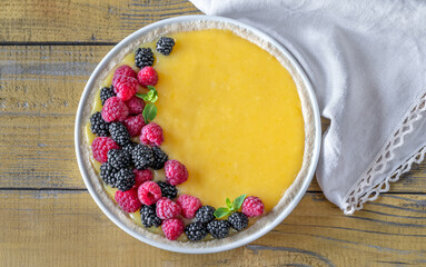 Lemon curd tart with fresh berries