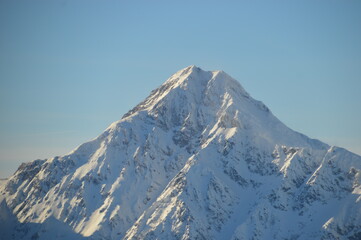 Skiing in the snow covered mountains of the San Domenico Ski Resort in Alps in Northern Italy