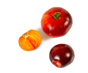 beautiful striped tomato isolated on white background