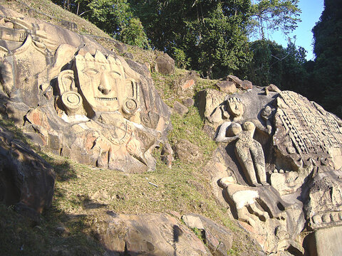 The mysterious old sculptured stone wall including the figures at a disclosed location, Tripura, India.