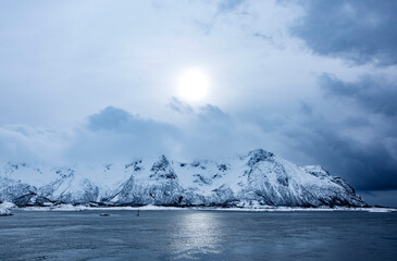 Sun over the mountains in Lofoten, Norway