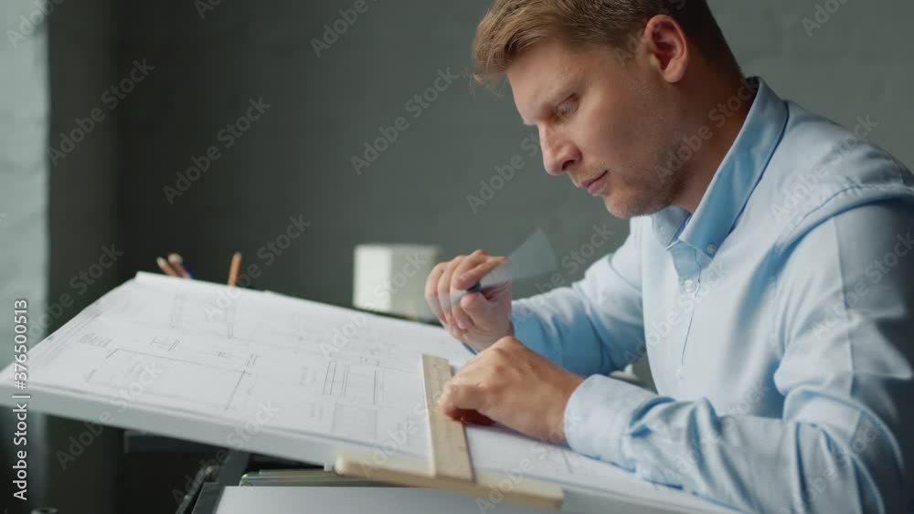 Poster Young architect at work in the office