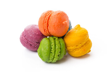 Pile of colorful meringue cookies isolated on white