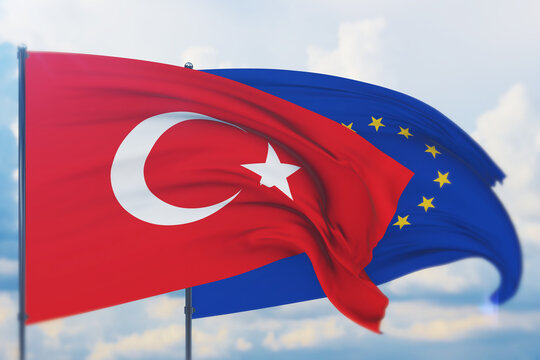 Waving European Union flag and flag of Turkey. Closeup view, 3D illustration.