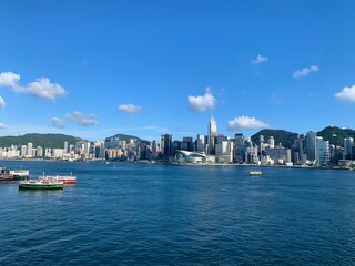 hong kong harbour blue sky cloud sea ferry ships