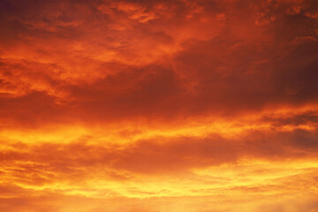 red sunset with clouds in the evening