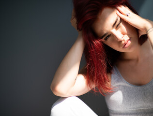 Beautiful young stylish ginger woman with freckles. Fashion portrait of charming girl wearing...