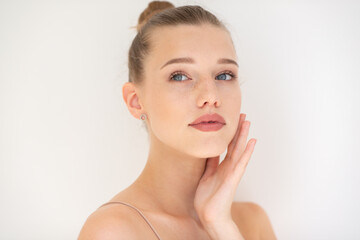 Portrait of beautiful woman with clean skin, youth concept, beauty treatment. Cheerful teen girl,...