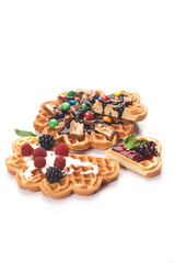 Freshly baked waffles with chocolate isolated on white background