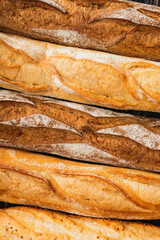 close up view of fresh baked baguette loaves