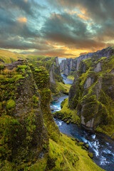 Unique landscape of Fjadrargljufur in Iceland. Top tourism destination. Fjadrargljufur Canyon is a massive canyon about 100 meters deep and about 2 kilometers long, located in South East of Iceland..