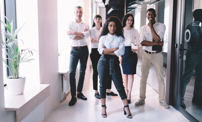 Fototapeta premium Confident business group standing in hall