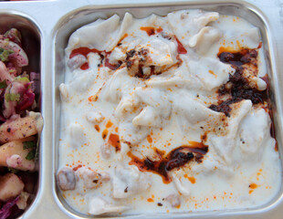 Turkish ravioli with delicious butter on a serving plate