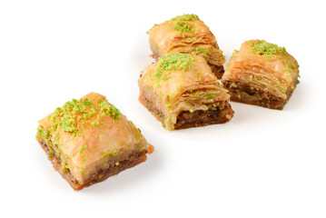 Pistachio baklava on a white background. Dessert.