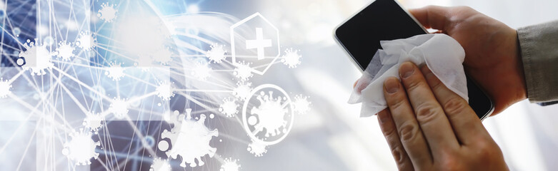 Сleaning concept. Wipe dirt off surfaces. Disinfectant treatment of phone screenl. Sanitary...