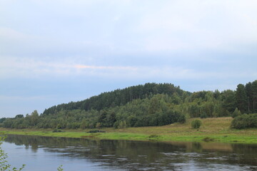 View of the river in the countryside at sunset