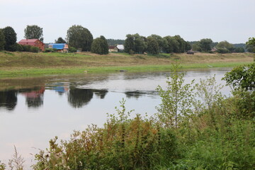 Fototapeta premium View of the river in the countryside at sunset