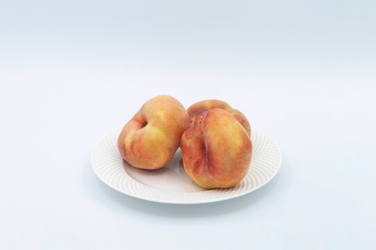 THREE PIECES OF FRUIT CALLED PARAGUAYAS