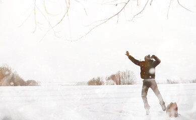 A man on a walk. Winter landscape. Tourist in winter journey.