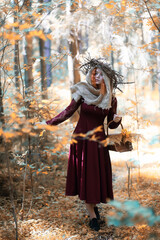 Obraz premium Fortune-teller conducts a ritual autumn