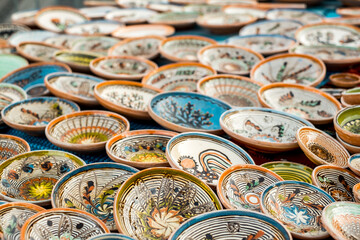 Happy colorful ceramics. Traditional Romanian handmade ceramics market at the potters fair from Sibiu, Romania