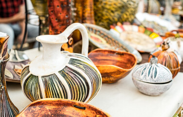 Happy colorful ceramics. Traditional Romanian handmade ceramics market at the potters fair from Sibiu, Romania