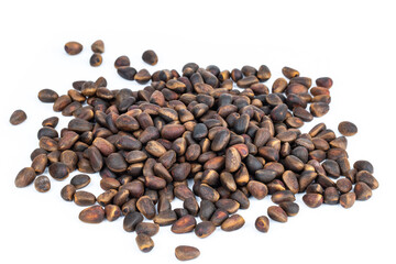 Pine nuts. A bunch of cedar on a white background.