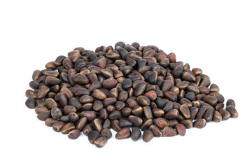 Pine nuts. A bunch of cedar on a white background.