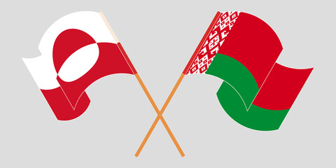 Crossed and waving flags of Greenland and Bahrain