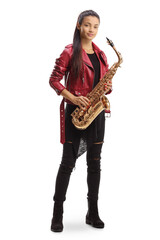 Full length portrait of a female saxophonist in a red leather holding a saxophone