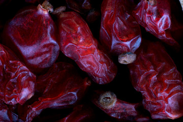 super macro shot of red dried berries barberry from Turkey in detail very close. Ideal food and spice background