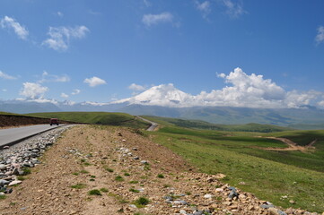 mountain landscape with blue sky and clouds