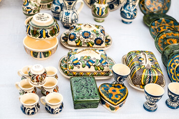 Happy colorful ceramics. Traditional Romanian handmade ceramics market at the potters fair from Sibiu, Romania