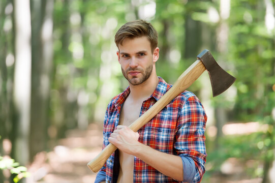 Logging season. Lumberman carry axe in forest. Forestry logging. Chopping wood. Summer nature. Natural landscape. Ecology and environment. Lumberjack style