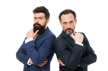 Fototapeta premium Brainstorming. Serious businessmen isolated on white. Business partners with serious look. Bearded men think with serious faces. Serious and thoughtful