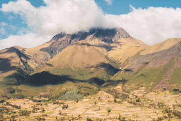Imbabura Volcano situated in the north of ecuador with a beutiful blue sky in the background with some clouds