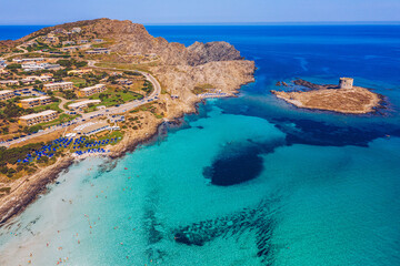 Stunning aerial view of Pelosa Beach (Spiaggia Della Pelosa) with Torre della Pelosa and Capo Falcone. Stintino, Sardinia, Italy. La Pelosa beach, probably the most beautiful beach in Sardinia, Italy