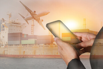 Woman hand hold and touch screen smartphone, container cargo ship, cargo plane and airplane take...