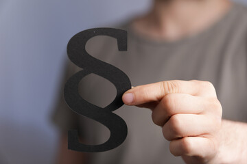 paragraph law sign digital in hand black.